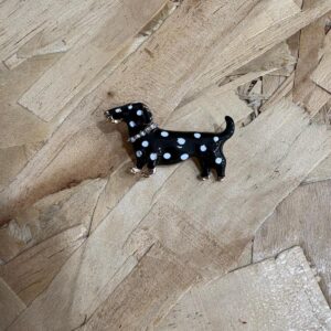 Broche salchicha motas